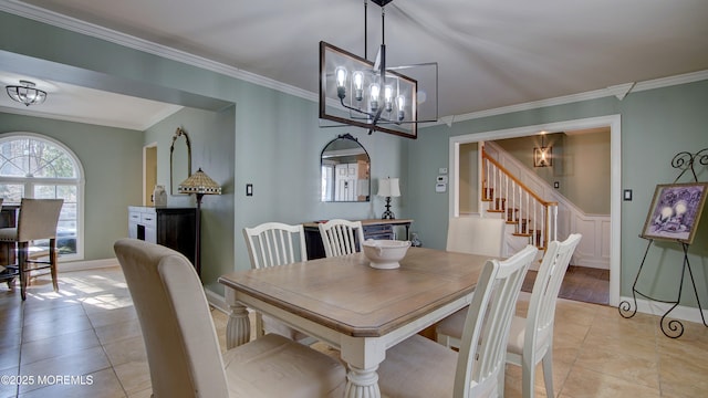 dining space with ornamental molding, a notable chandelier, stairway, and light tile patterned floors