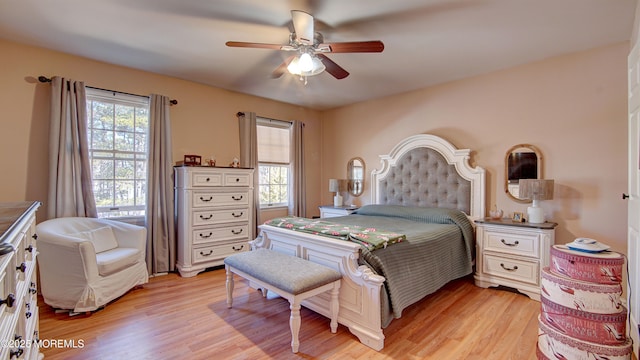 bedroom featuring ceiling fan and light wood finished floors