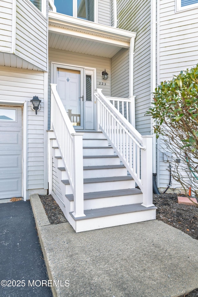 entrance to property featuring a garage