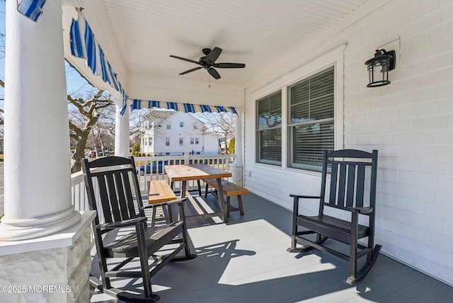 view of patio / terrace with ceiling fan and outdoor dining area