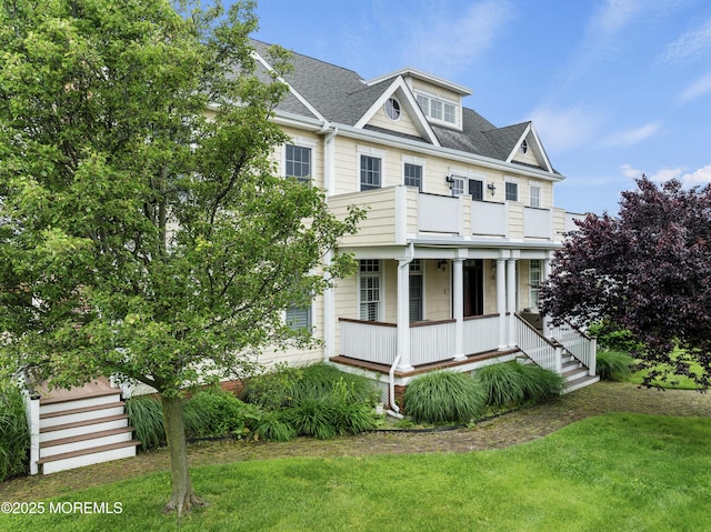 18 Riverdale Ave, Monmouth Beach, NJ 07750 - view of side of home featuring a porch, a lawn, roof with shingles, and stairway