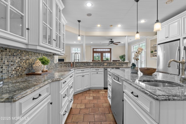18 Riverdale Ave, Monmouth Beach, NJ 07750 - kitchen featuring ceiling fan, white cabinets, stainless steel appliances, backsplash, and recessed lighting