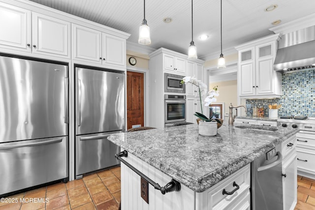 18 Riverdale Ave, Monmouth Beach, NJ 07750 - kitchen with stainless steel appliances, tasteful backsplash, white cabinetry, an island with sink, and a sink
