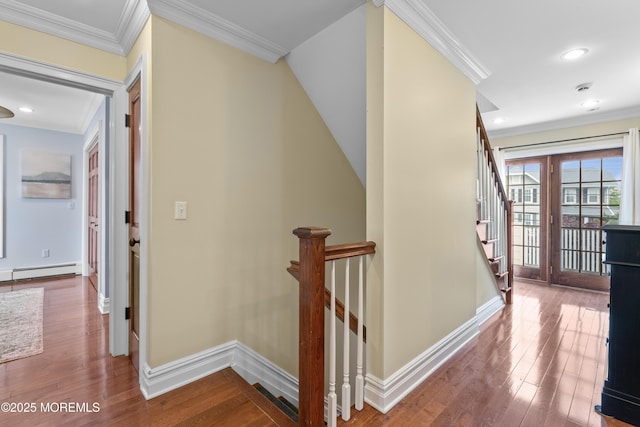18 Riverdale Ave, Monmouth Beach, NJ 07750 - hall with a baseboard radiator, wood finished floors, ornamental molding, baseboards, and stairway