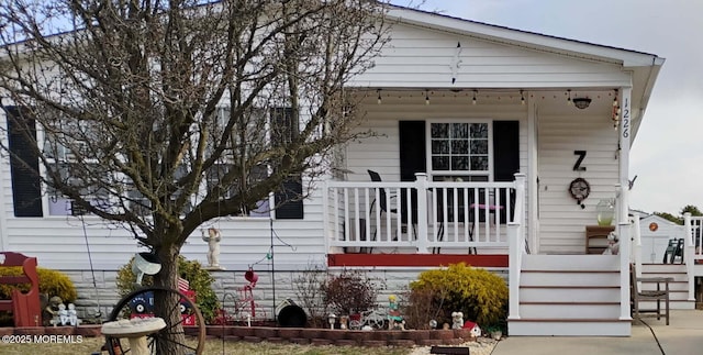 view of front of home with covered porch