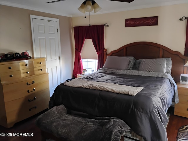 bedroom featuring ornamental molding and a ceiling fan