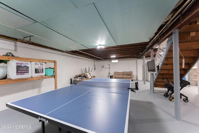 game room featuring concrete flooring