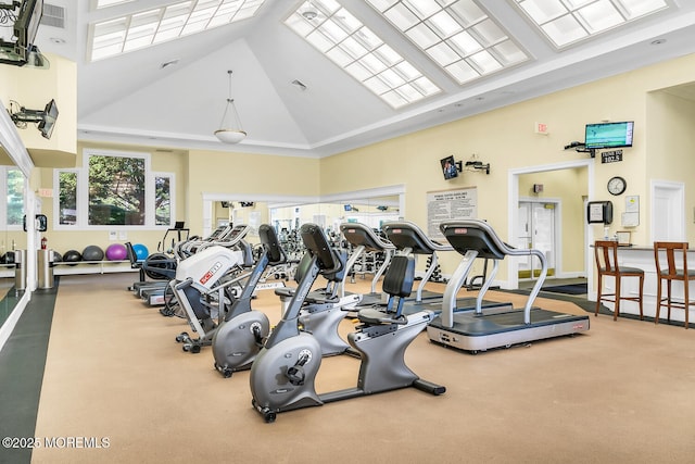 workout area with high vaulted ceiling, visible vents, and carpet flooring