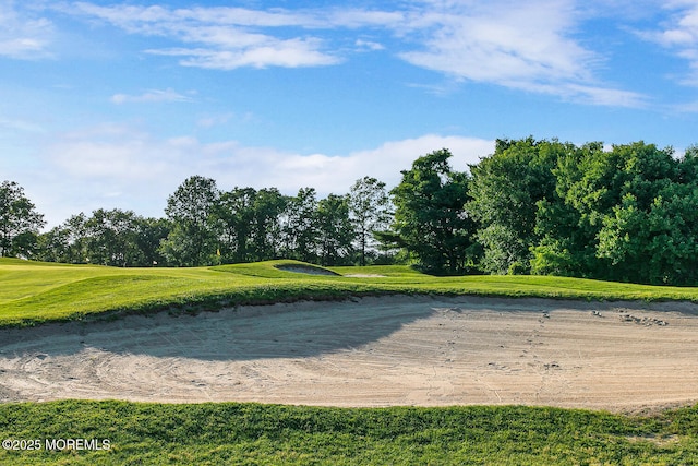 view of property's community featuring golf course view