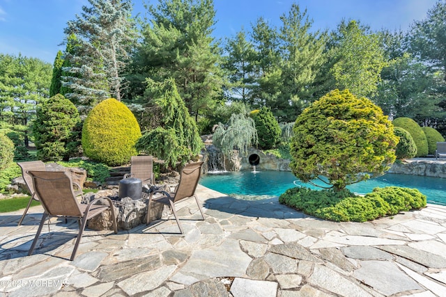 pool featuring a patio area