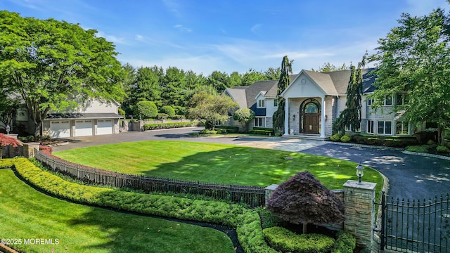 view of front of house featuring a front yard and fence