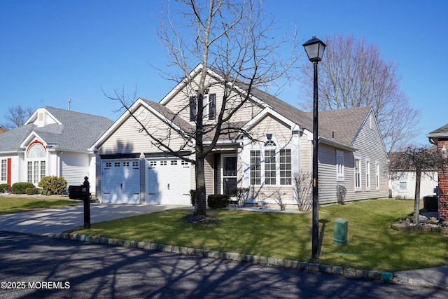 view of front of home featuring aphalt driveway, central AC unit, a garage, a shingled roof, and a front lawn