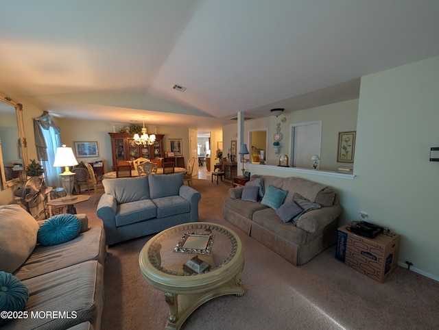 living room with carpet floors, visible vents, a chandelier, and vaulted ceiling