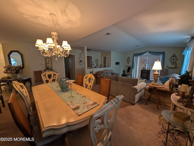 carpeted dining space with lofted ceiling, visible vents, and a chandelier