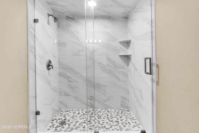 bathroom featuring a stall shower