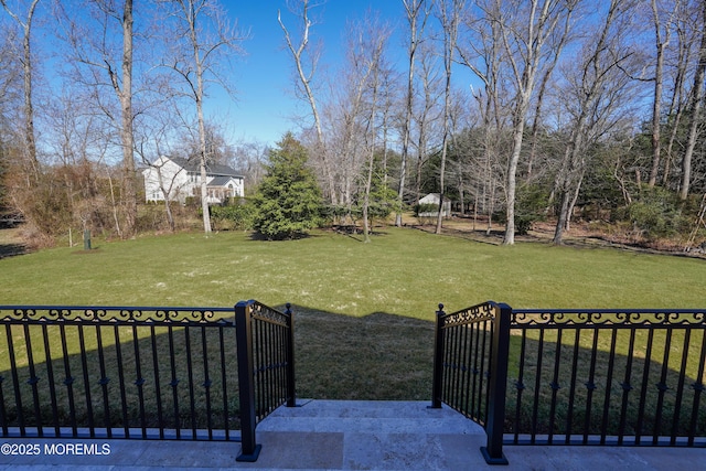 view of yard featuring a gate and fence