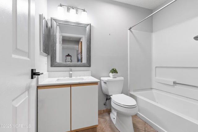 full bath featuring shower / bathtub combination, toilet, vanity, baseboards, and tile patterned floors