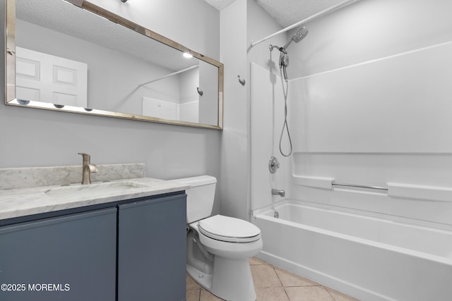 bathroom with toilet, shower / tub combination, tile patterned floors, a textured ceiling, and vanity