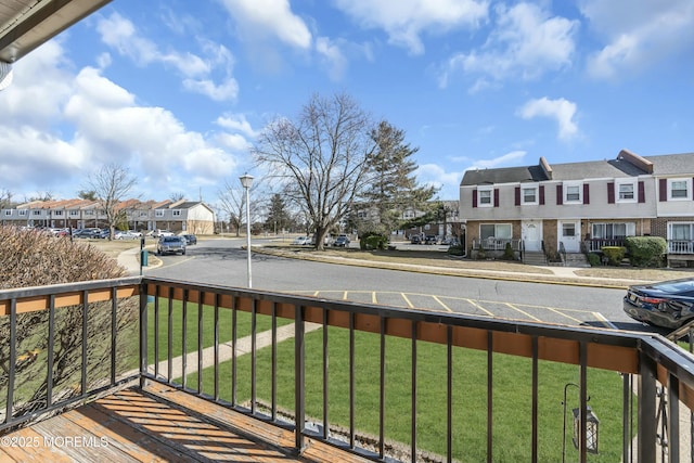 balcony featuring a residential view