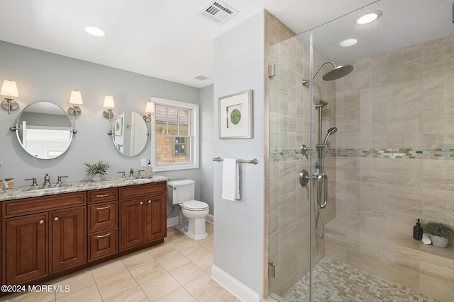 full bathroom featuring double vanity, a sink, visible vents, and a shower stall