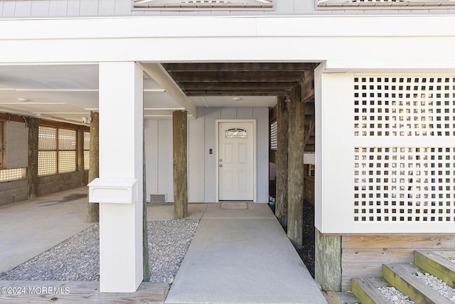 property entrance with board and batten siding