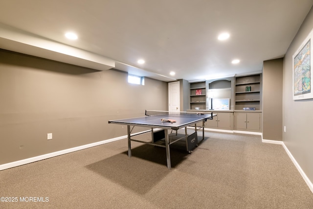 game room featuring light colored carpet, recessed lighting, and baseboards