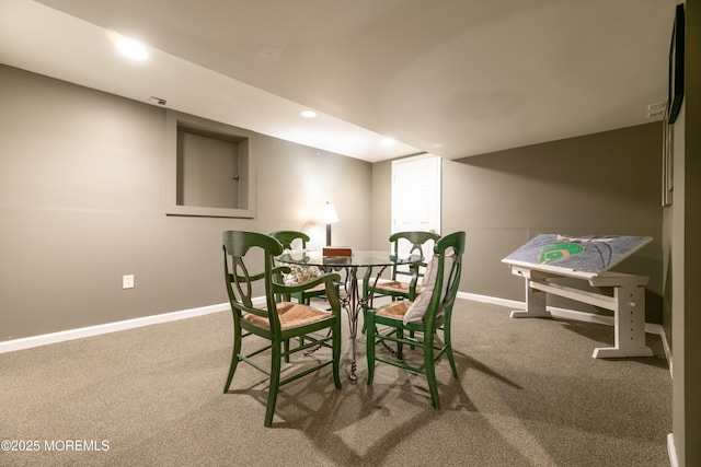 carpeted dining room featuring recessed lighting and baseboards