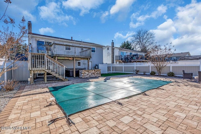 view of swimming pool featuring a fenced backyard, stairs, a fenced in pool, and a patio