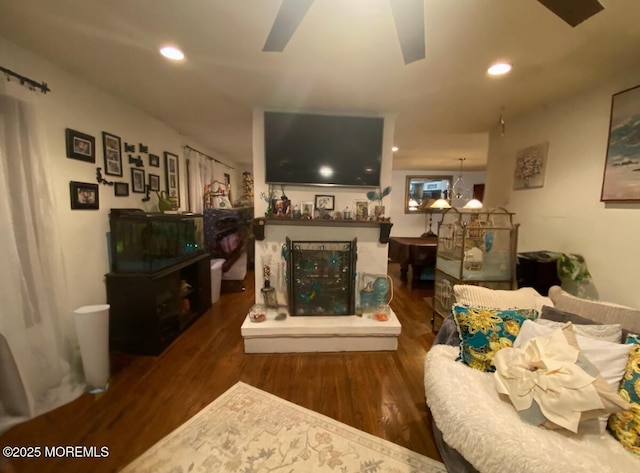 living room with recessed lighting, wood finished floors, and ceiling fan