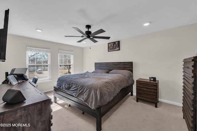 bedroom with light carpet, baseboards, a ceiling fan, and recessed lighting