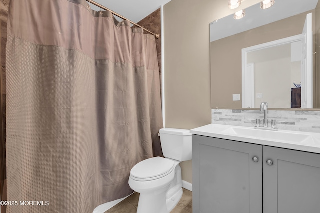 bathroom featuring toilet, a shower with shower curtain, tile patterned floors, vanity, and decorative backsplash