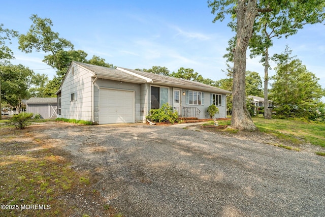 625 Twin River Dr, Forked River, NJ 08731 - ranch-style house featuring a garage and asphalt driveway