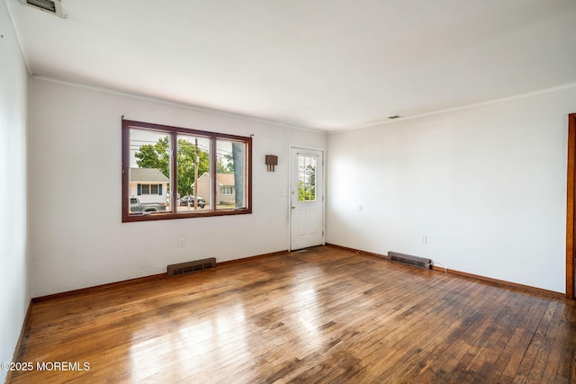 625 Twin River Dr, Forked River, NJ 08731 - unfurnished room featuring ornamental molding, hardwood / wood-style floors, and baseboards