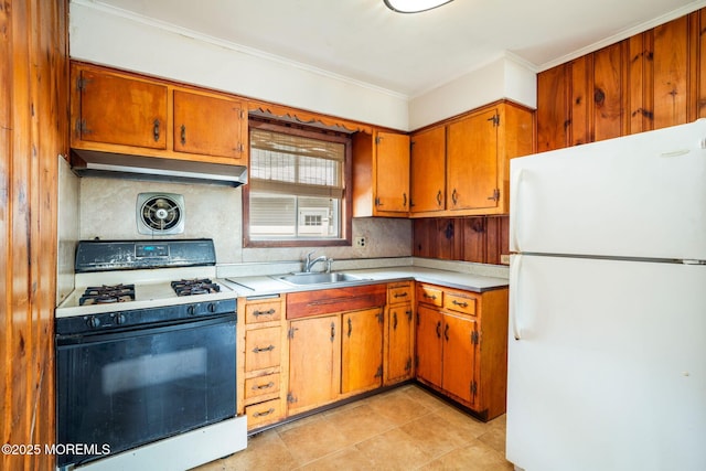 625 Twin River Dr, Forked River, NJ 08731 - kitchen featuring white appliances, a sink, under cabinet range hood, light countertops, and crown molding