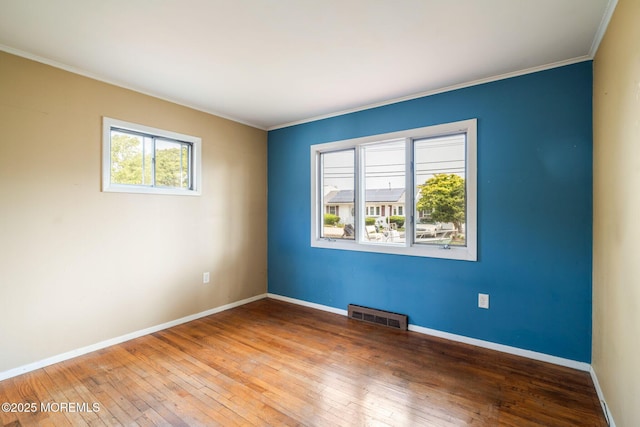 625 Twin River Dr, Forked River, NJ 08731 - spare room with ornamental molding, wood-type flooring, and baseboards