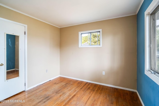 625 Twin River Dr, Forked River, NJ 08731 - empty room with light wood-style floors, baseboards, and ornamental molding