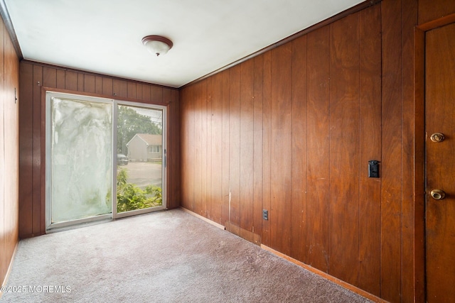 625 Twin River Dr, Forked River, NJ 08731 - carpeted empty room with wooden walls and baseboards