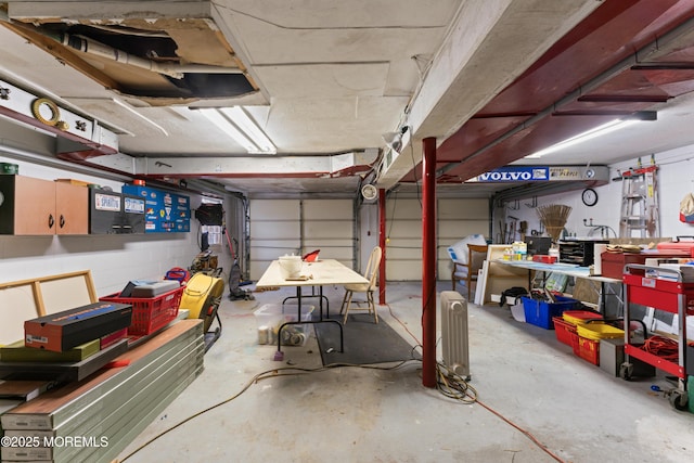 garage with concrete block wall