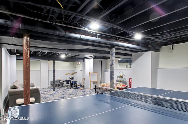 recreation room featuring concrete floors