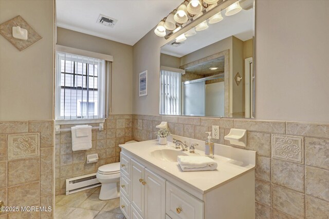 full bathroom with toilet, visible vents, baseboard heating, tile patterned floors, and a stall shower