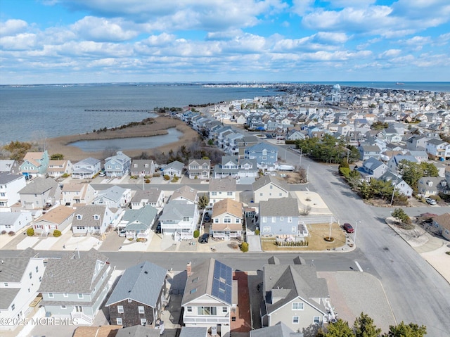 aerial view featuring a residential view and a water view