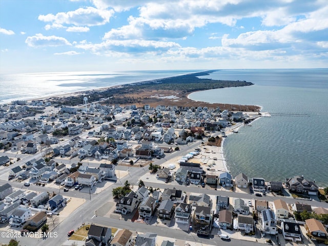 birds eye view of property with a residential view and a water view