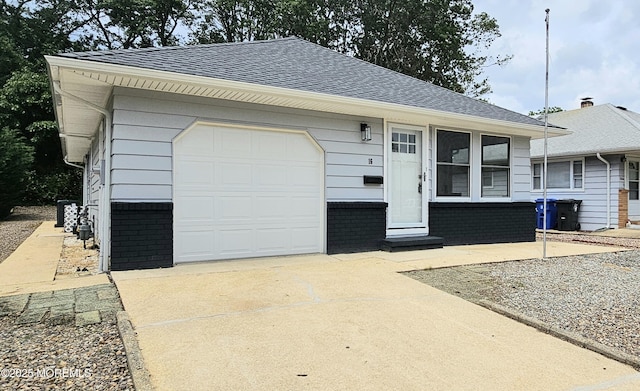 16 Mount Kisco Dr, Toms River, NJ 08753 - view of front of property with brick siding, a shingled roof, driveway, and a garage