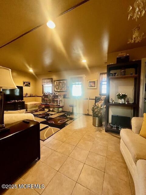 living area featuring tile patterned flooring