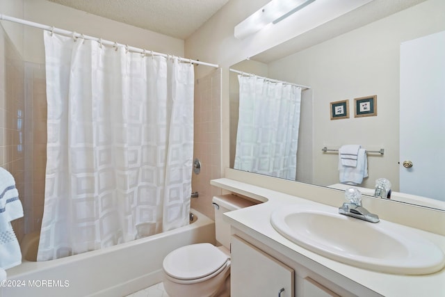 full bath with toilet, shower / bath combo with shower curtain, a textured ceiling, and vanity