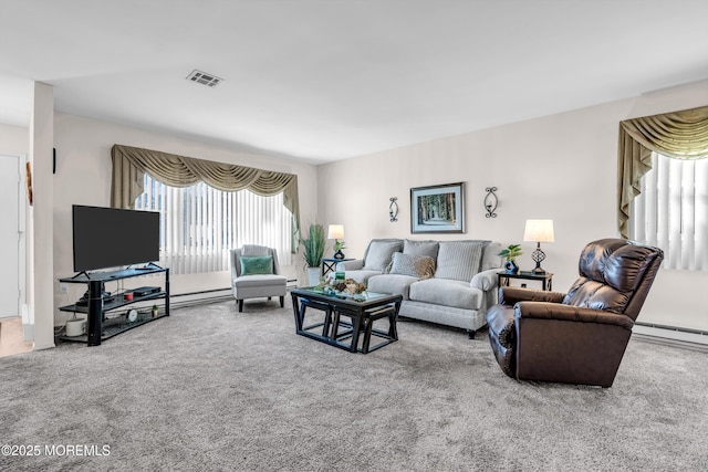 carpeted living area with a baseboard heating unit, a baseboard radiator, and visible vents