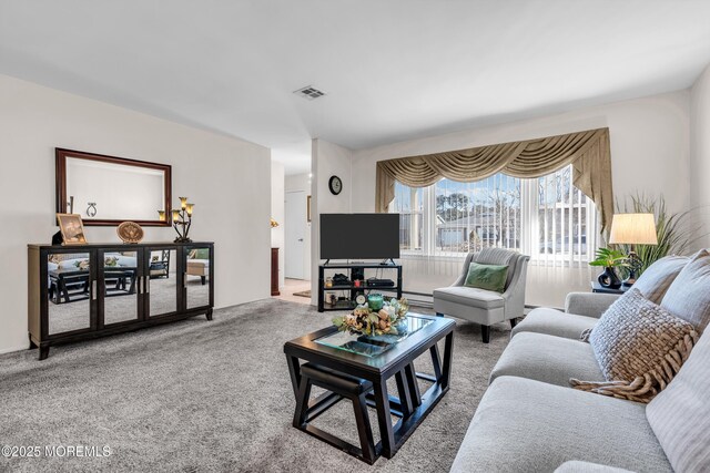 carpeted living area with visible vents