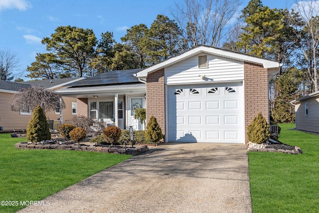 single story home featuring an attached garage, covered porch, and brick siding