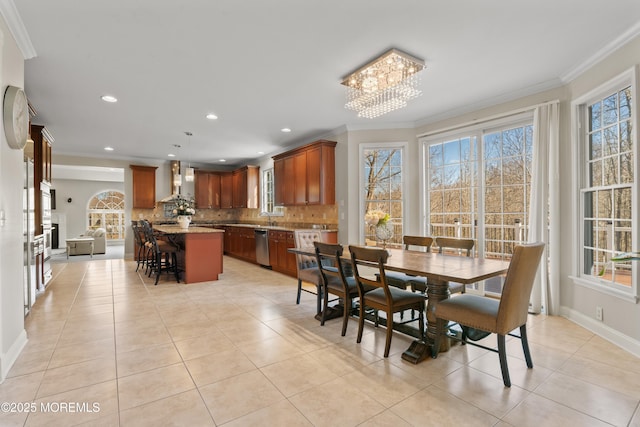 dining space with light tile patterned floors, recessed lighting, ornamental molding, a chandelier, and baseboards