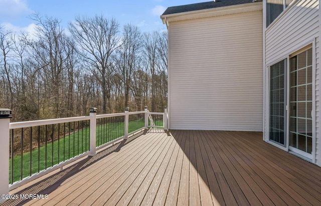 deck featuring a yard